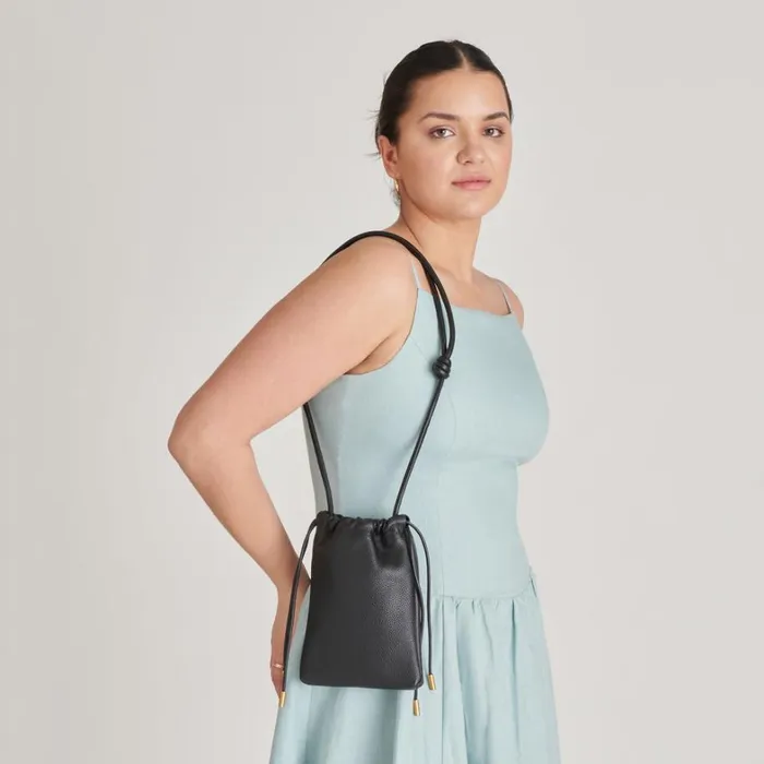Handbags Women Dolce Vita Evie Crossbody Pouch Black Pebble Leather